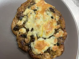 Отбивная из свинины с грибами и сыром