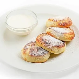 Сырники со сметаной и медом